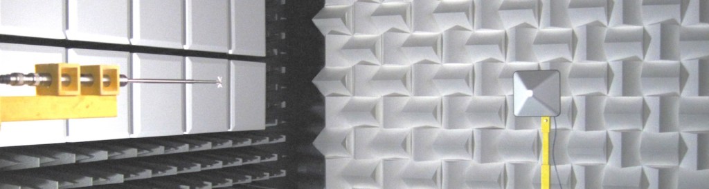 Photo showing the Site VSWR measurements in an anechoic chamber using a log periodic receive antenna and a miniature biconical transmit antenna.